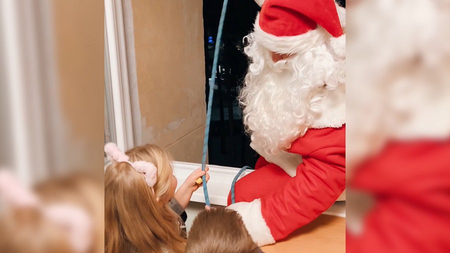 Как висагинцы встретили Новый год? Явление Деда Мороза через окна 9-этажек и другие сюрпризы (видео) - В Висагинасе