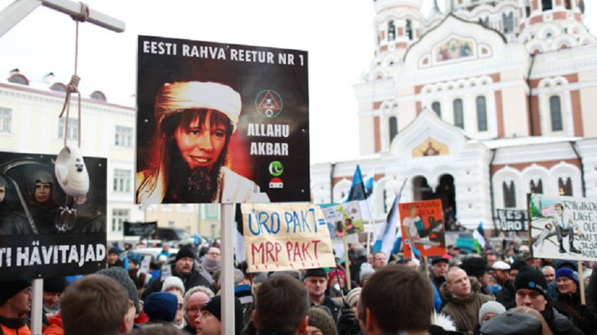 У эстонского парламента произошла потасовка из-за миграционного договора