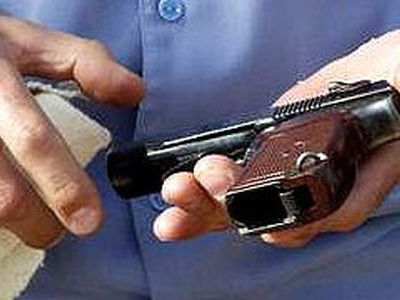 В поликлинику — с оружием                                                          - Происшествия и криминал